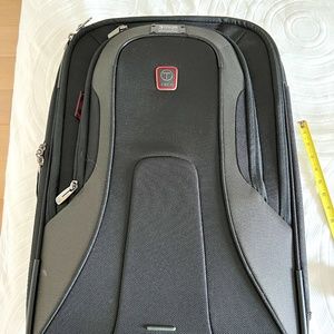 TUMI TECH ROLLING CARRY-ON SUITCASE